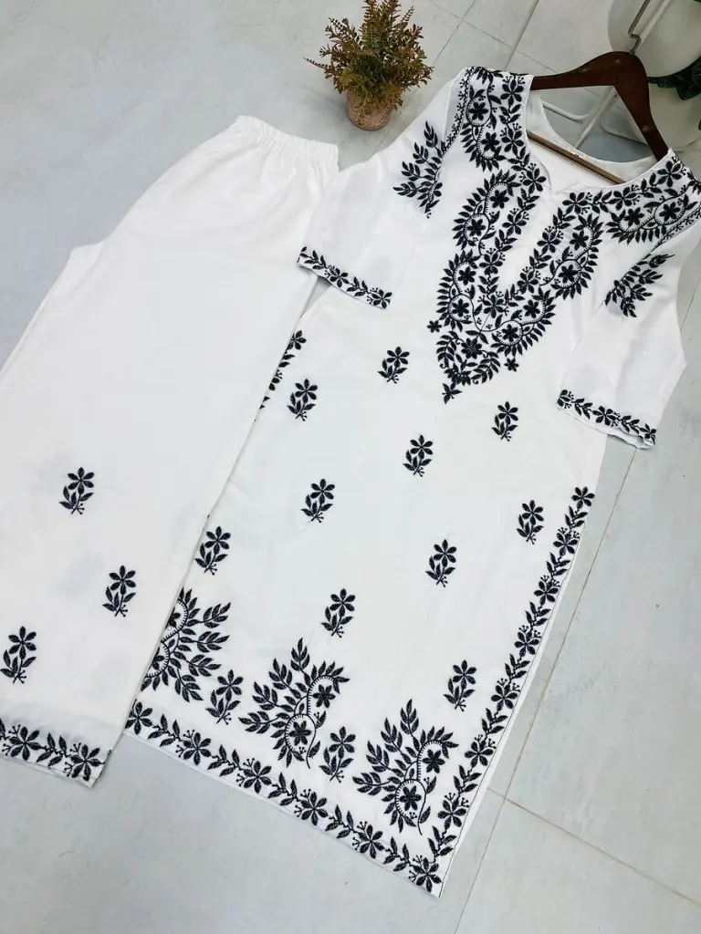 FANCY-MUSLIN-EMBROIDERY-WORK-KURTI-PALAZZO-SET-CASAUL-WEAR-WHOLESALE-PRICE-ETHNIC-GARMENT-1.webp
